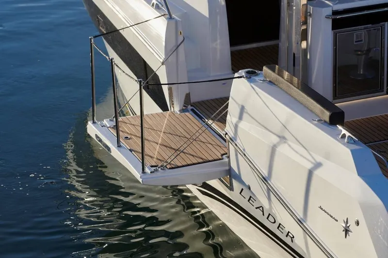 Slide: The Image of 2025 Jeanneau Leader 10.5 WA Series 2 yacht with extended swim platform. - 11