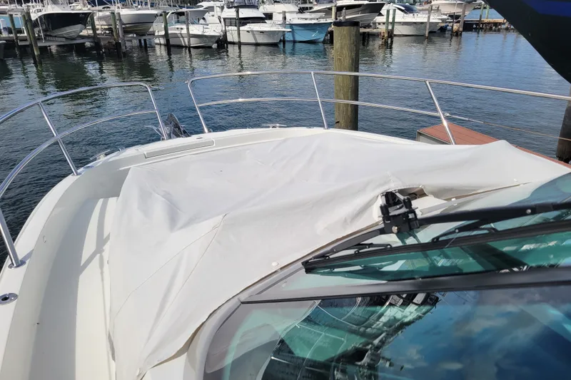 Slide: The Image of 2025 Jeanneau Leader 10.5 WA Series 2 yacht docked at marina. - 4