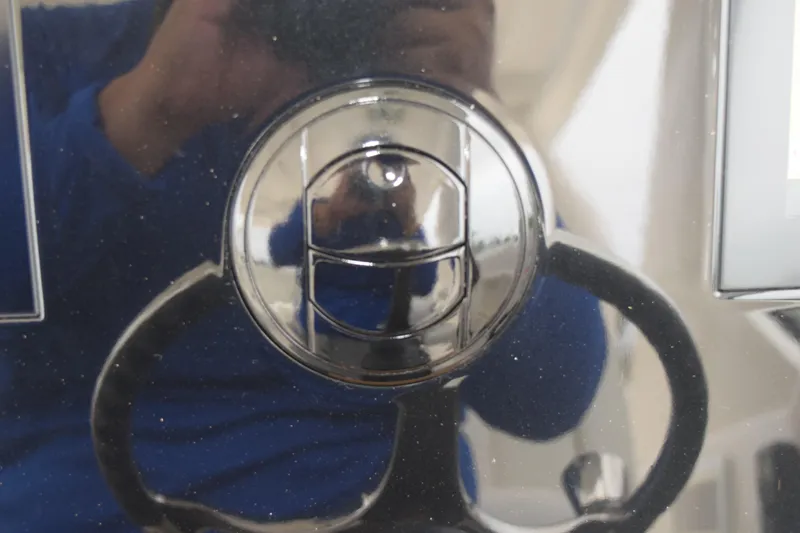 Slide: The Image of Close-up of 2022 Pursuit OS 355 Offshore steering wheel and control panel. - 279
