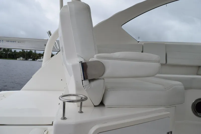Slide: The Image of 2022 Pursuit OS 355 Offshore boat seat with cup holder, white leather upholstery. - 164