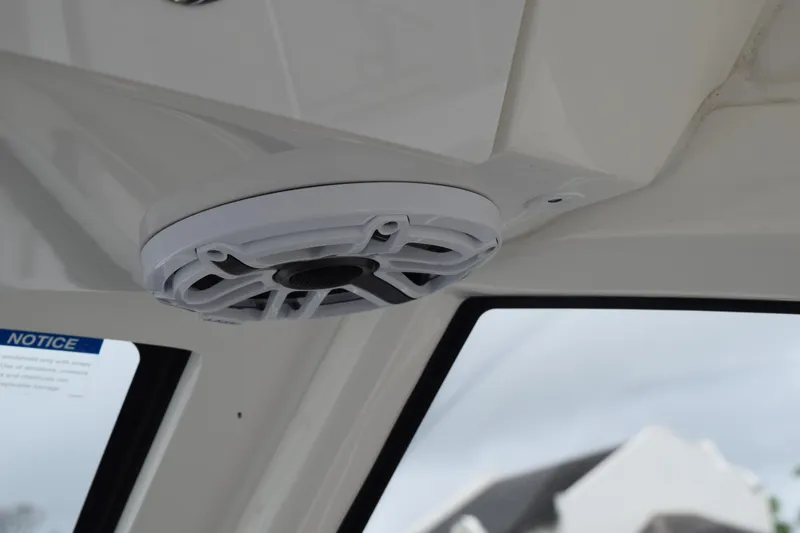 Slide: The Image of Ceiling speaker inside 2022 Pursuit OS 355 Offshore boat cabin. - 212