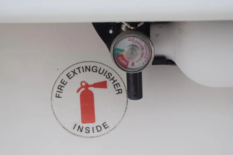 Slide: The Image of Fire extinguisher gauge on 2022 Pursuit OS 355 Offshore boat, safety equipment. - 117