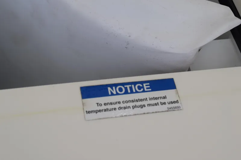 Slide: The Image of Notice label on 2022 Pursuit OS 355 Offshore, ensuring internal temperature consistency. - 179