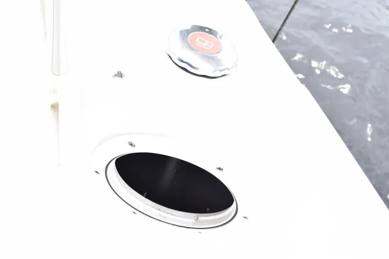 Slide: The Image of 2022 Pursuit OS 355 Offshore boat deck detail with open hatch and water view. - 48