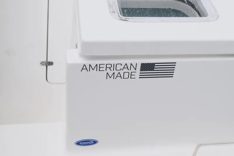 Slide: The Image of American-made Pursuit OS 355 Offshore boat, 2022 model, with flag decal. - 72