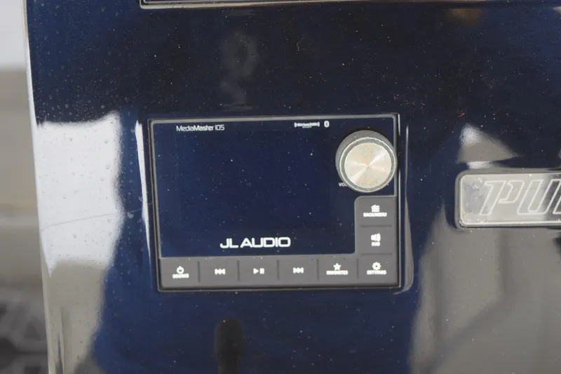 Slide: The Image of JL Audio MediaMaster 105 on 2022 Pursuit OS 355 Offshore boat dashboard. - 277
