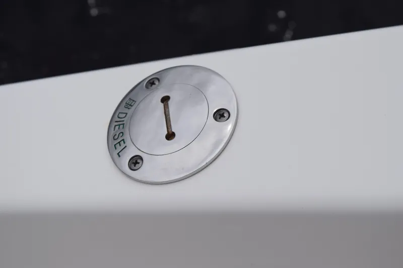 Slide: The Image of Diesel fuel cap on 2022 Pursuit OS 355 Offshore boat. - 83
