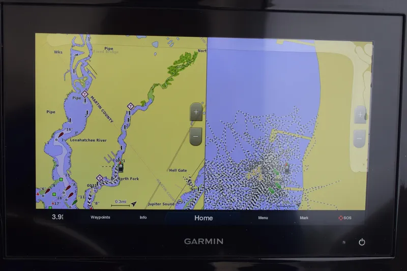 Slide: The Image of Garmin navigation screen on 2022 Pursuit OS 355 Offshore boat, displaying Loxahatchee River map. - 282