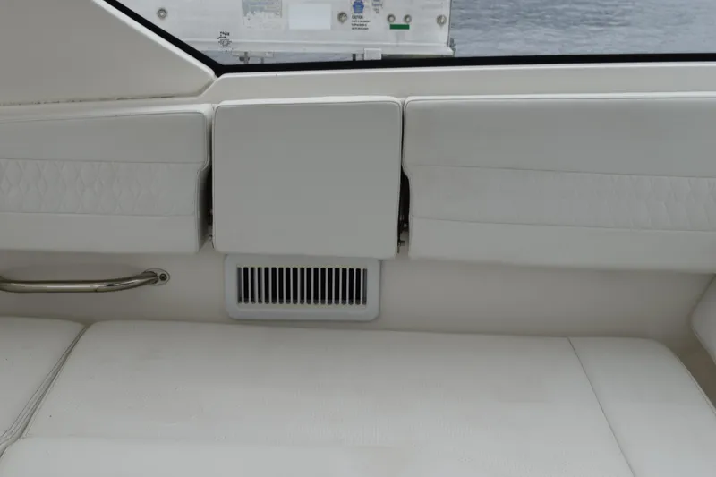 Slide: The Image of Interior of 2022 Pursuit OS 355 Offshore boat with white seating and vent. - 239