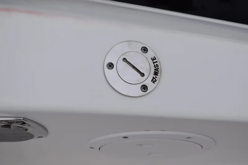 Slide: The Image of Waste outlet on 2022 Pursuit OS 355 Offshore boat, close-up view. - 102