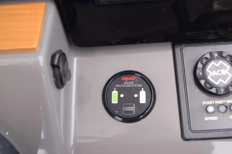 Slide: The Image of Control panel of 2022 Pursuit OS 355 Offshore boat with engine shutdown system. - 284