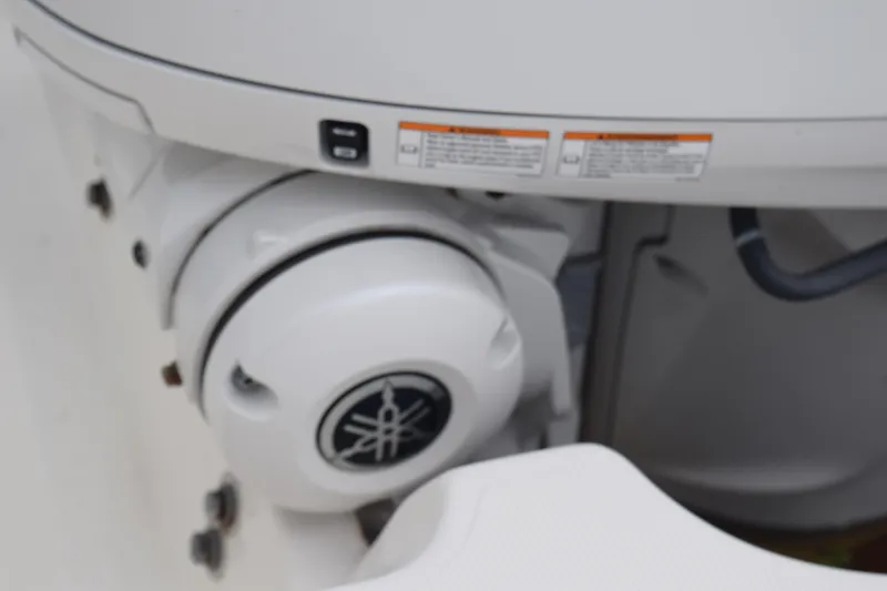 Slide: The Image of 2022 Pursuit OS 355 Offshore boat engine detail with Yamaha logo. - 89