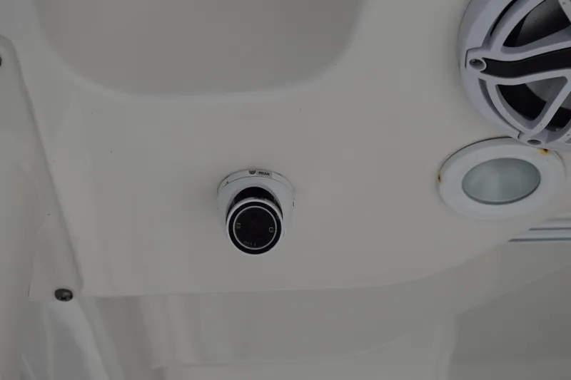 Slide: The Image of 2022 Pursuit OS 355 Offshore boat interior with camera and speaker system. - 25