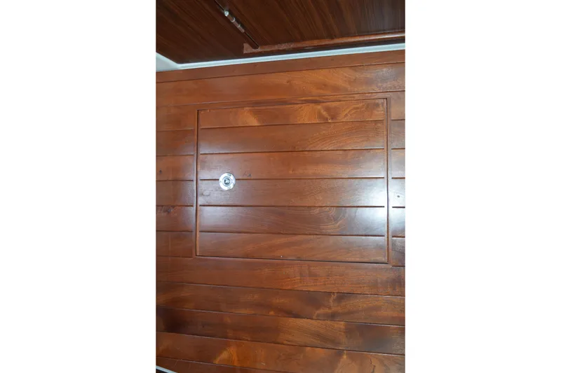 Slide: The Image of Wooden cabin interior of 2022 Pursuit OS 355 Offshore boat. - 445