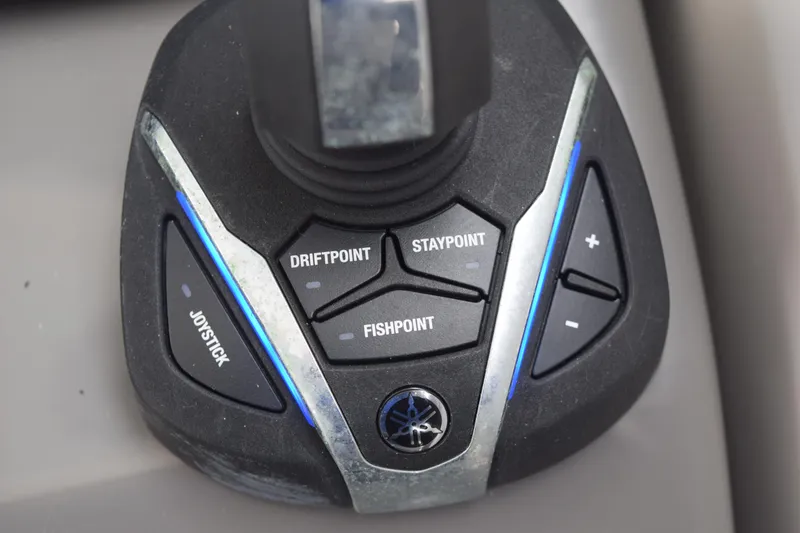 Slide: The Image of Joystick control panel on 2022 Pursuit OS 355 Offshore boat with DriftPoint and StayPoint features. - 289