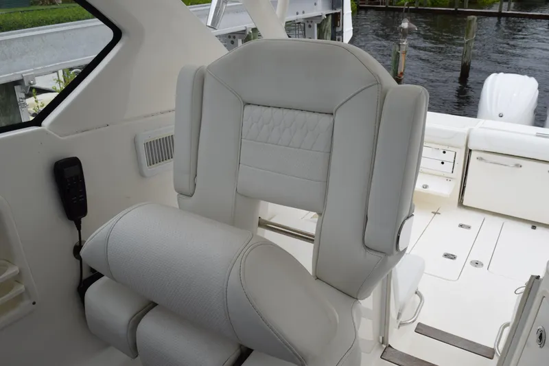 Slide: The Image of 2022 Pursuit OS 355 Offshore boat interior with luxurious seating and modern design. - 254