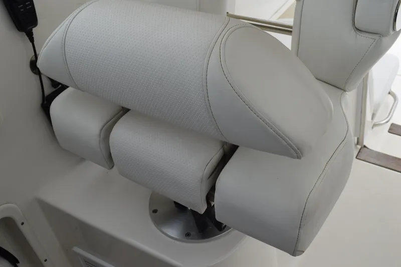 Slide: The Image of 2022 Pursuit OS 355 Offshore boat seat, white leather upholstery, modern design. - 257