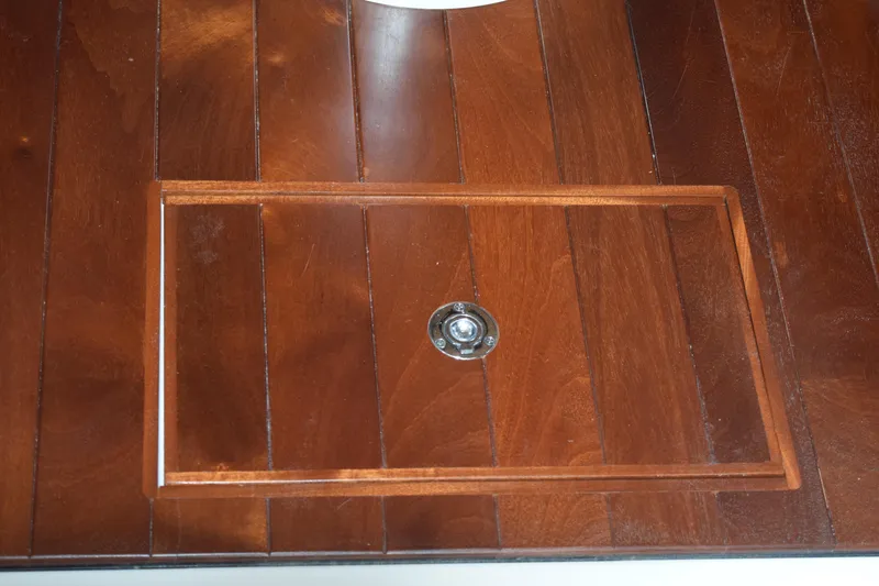 Slide: The Image of Wooden deck detail on 2022 Pursuit OS 355 Offshore boat. - 436