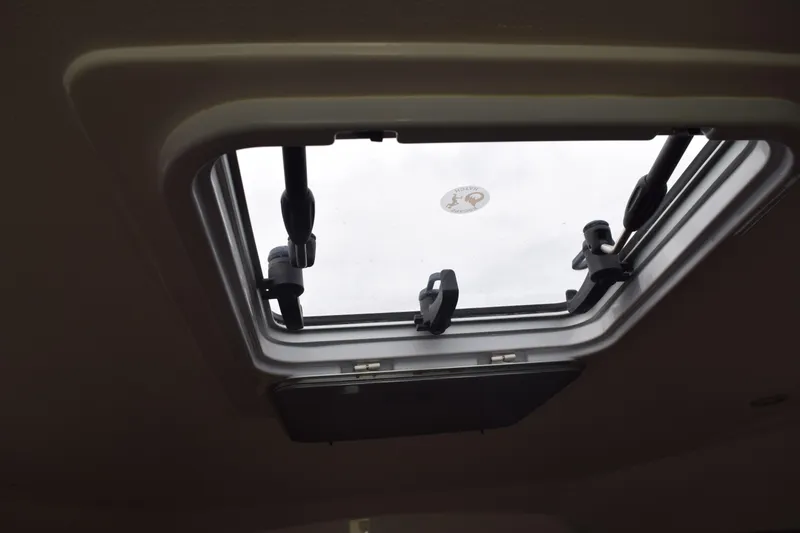 Slide: The Image of Open hatch on 2022 Pursuit OS 355 Offshore boat, viewed from interior. - 396