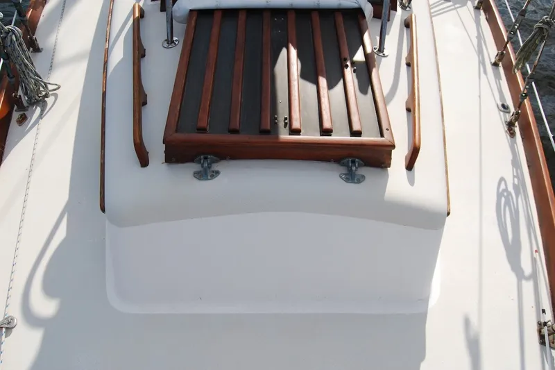 Slide: The Image of 1981 Bristol 40 Yawl deck with wooden hatch and fittings. - 28