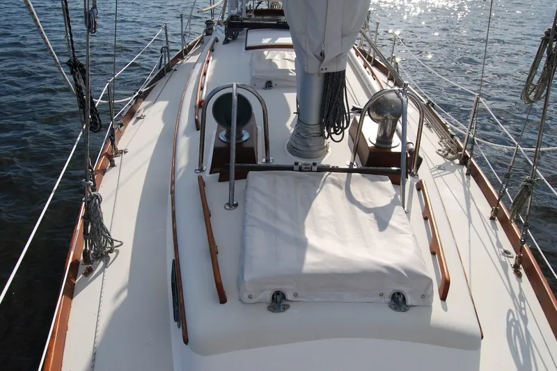 Slide: The Image of 1981 Bristol 40 Yawl sailboat deck with rigging and water view. - 29