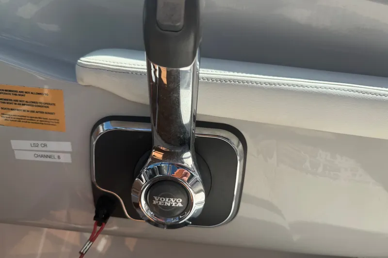 Slide: The Image of Volvo Penta throttle control on 2022 Regal LS2 boat dashboard. - 27