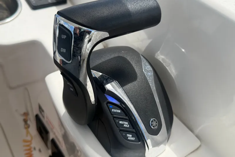 Slide: The Image of Throttle control of 2023 Edgewater 248CX Crossover boat, featuring Yamaha controls. - 46