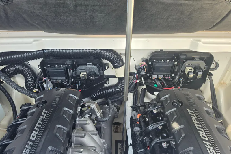Slide: The Image of 2022 Yamaha Boats 252SD engine compartment showcasing high output engines and wiring. - 89