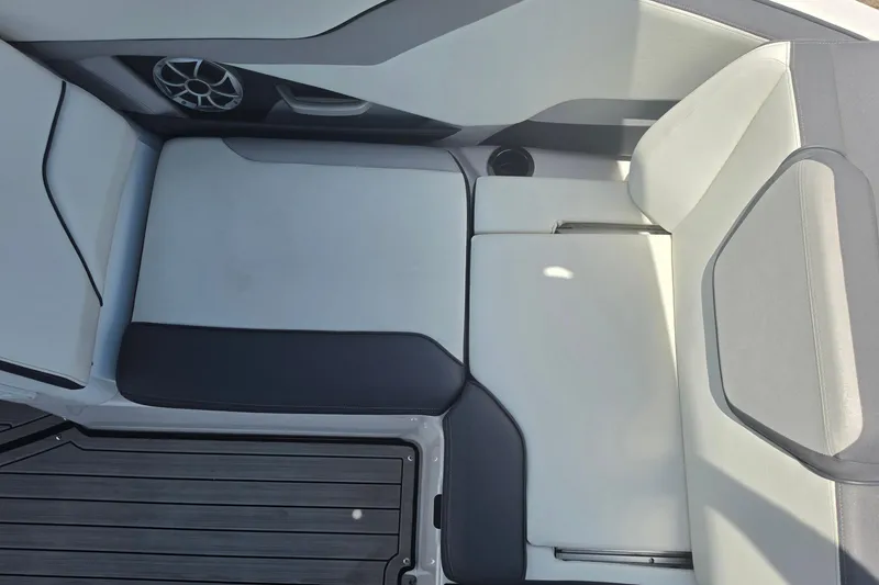 Slide: The Image of 2022 Yamaha Boats 252SD interior seating with sleek, modern design and premium materials. - 67