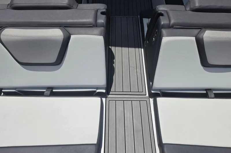 Slide: The Image of 2022 Yamaha Boats 252SD interior seating with sleek, modern design and comfortable upholstery. - 15