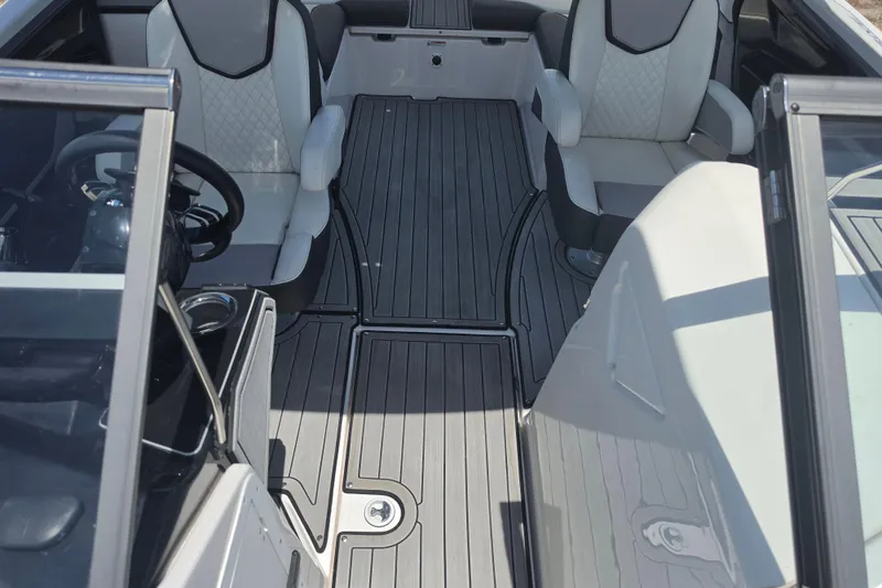 Slide: The Image of 2022 Yamaha Boats 252SD interior with sleek seating and modern design. - 78