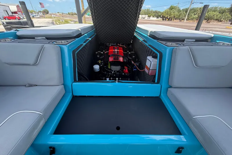 Slide: The Image of 2023 Heyday WTSurf boat engine compartment with seating and storage. - 33