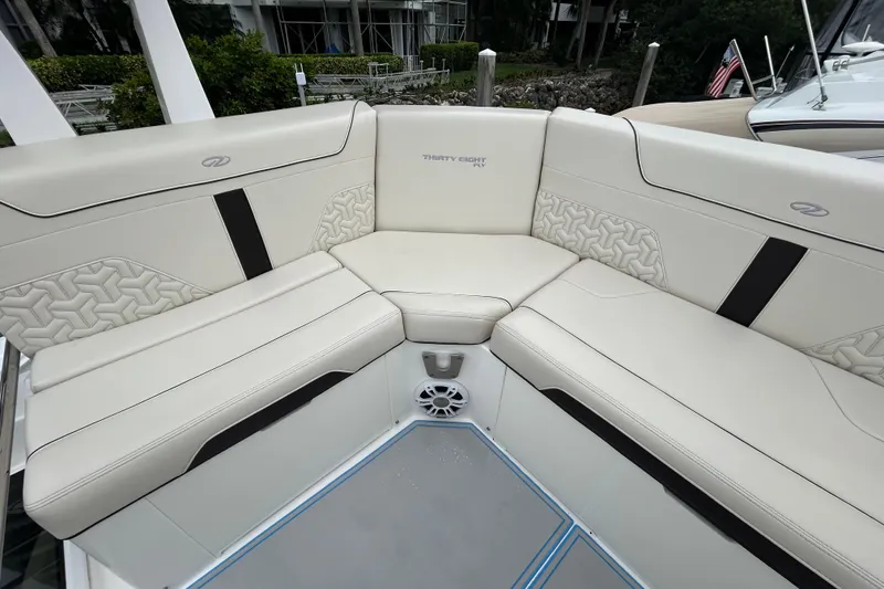 Slide: The Image of Luxurious seating area on 2023 Regal 38 FXO boat with elegant upholstery design. - 27