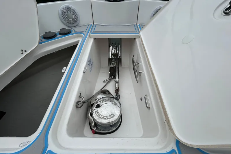 Slide: The Image of Anchor compartment of 2023 Regal 38 FXO boat with Lewmar windlass system. - 44