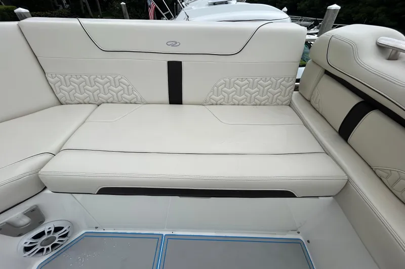 Slide: The Image of Luxurious seating on 2023 Regal 38 FXO boat with elegant upholstery design. - 29