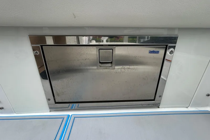 Slide: The Image of Stainless steel hatch on 2023 Regal 38 FXO boat deck. - 35