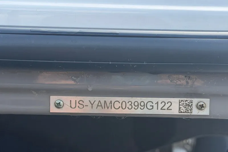 Slide: The Image of 2022 Yamaha Boats AR210 hull identification number plate with QR code. - 62