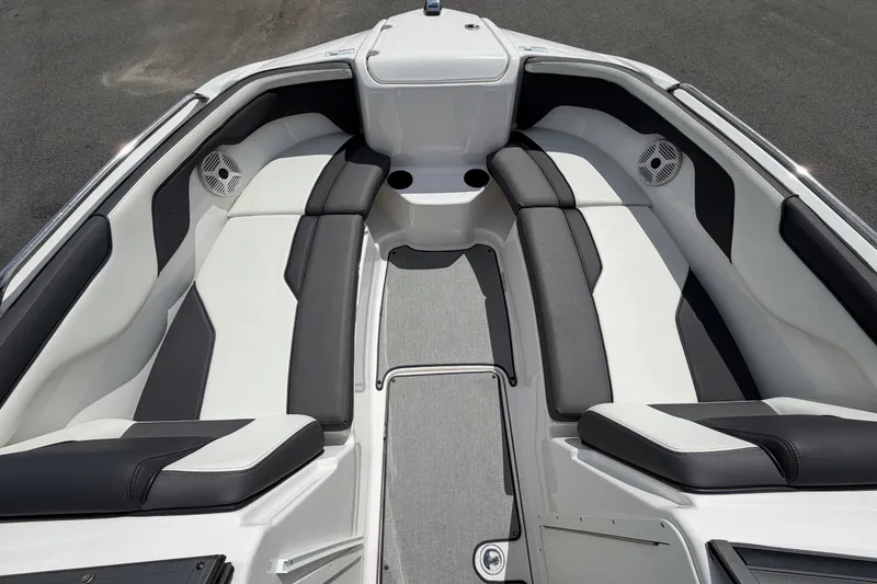 Slide: The Image of 2022 Yamaha Boats AR210 interior with sleek seating and modern design. - 39