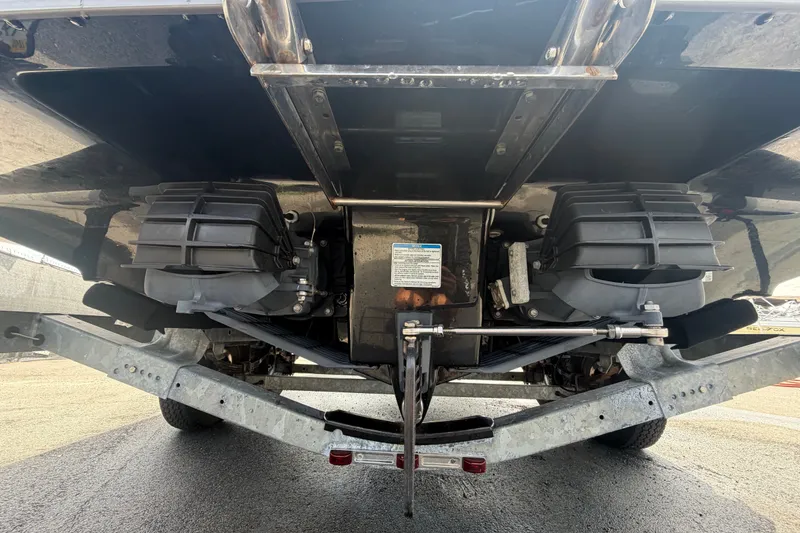 Slide: The Image of Rear view of a 2022 Yamaha Boats AR210 jet propulsion system on a trailer. - 4