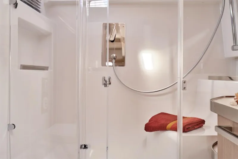 Slide: The Image of Manufacturer Provided Image: Modern bathroom in 2025 Four Winns TH36 yacht with sleek shower design. - 8