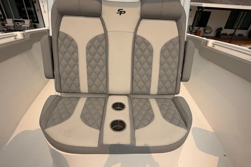 Slide: The Image of Luxury seating on 2023 Sea Pro 320 DLX Offshore boat with cup holders. - 37