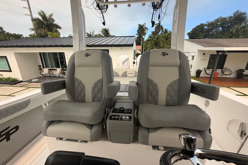 Slide: The Image of Luxury seating on 2023 Sea Pro 320 DLX Offshore boat, featuring modern design and comfort. - 39