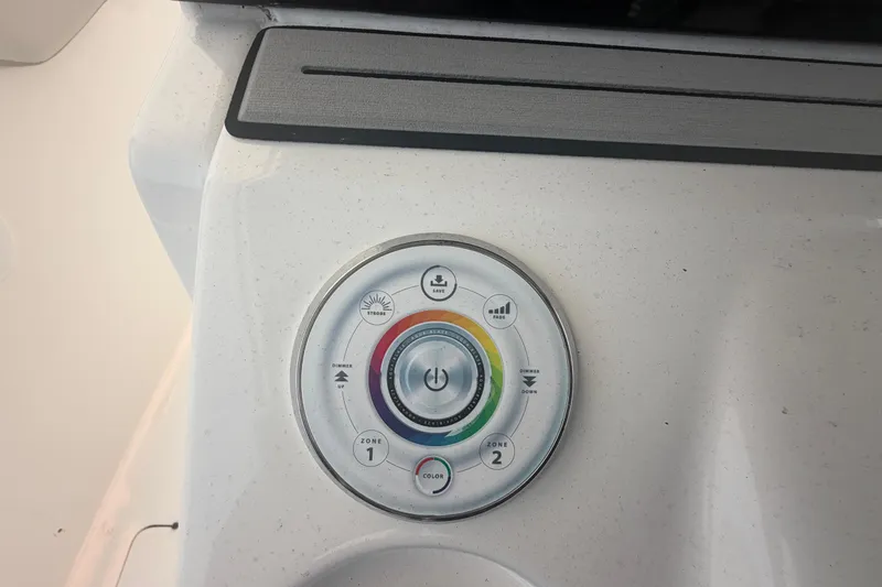 Slide: The Image of Control panel of 2023 Sea Pro 320 DLX Offshore boat, featuring various function buttons. - 28