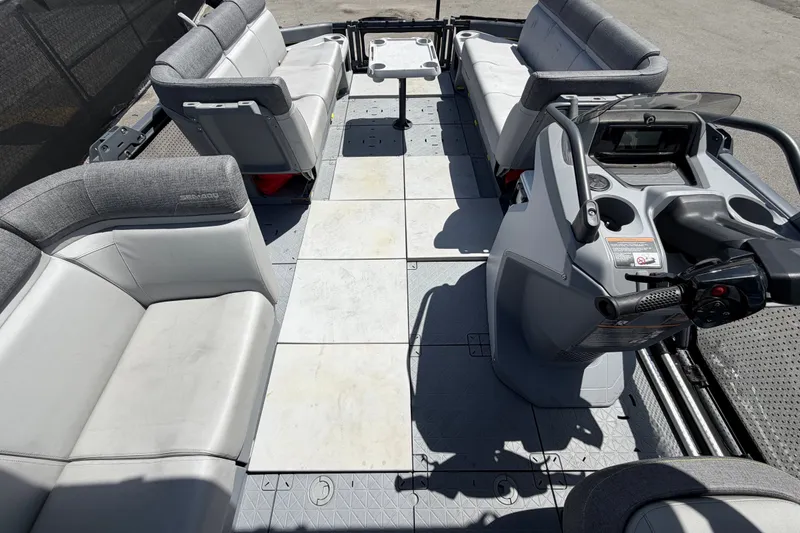 Slide: The Image of 2023 Sea-Doo Switch Cruise 21 interior with spacious seating and modern controls. - 45