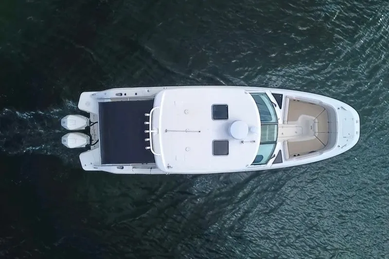 Slide: The Image of Aerial view of 2021 Boston Whaler 320 Vantage boat on water. - 10