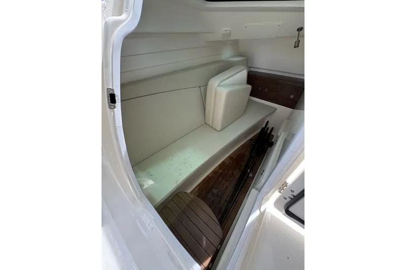 Slide: The Image of Interior cabin of 2021 Boston Whaler 320 Vantage with seating and storage. - 69