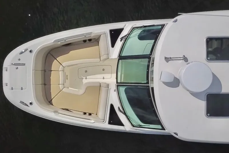 Slide: The Image of Aerial view of 2021 Boston Whaler 320 Vantage boat with spacious seating. - 14