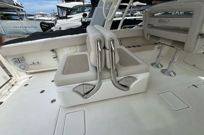 Slide: The Image of 2021 Boston Whaler 320 Vantage boat interior with seating and deck details. - 45