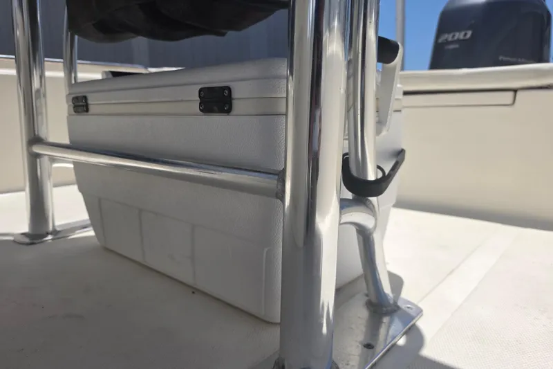 Slide: The Image of 2021 Bulls Bay 2200 boat interior with cooler and stainless steel railing. - 77