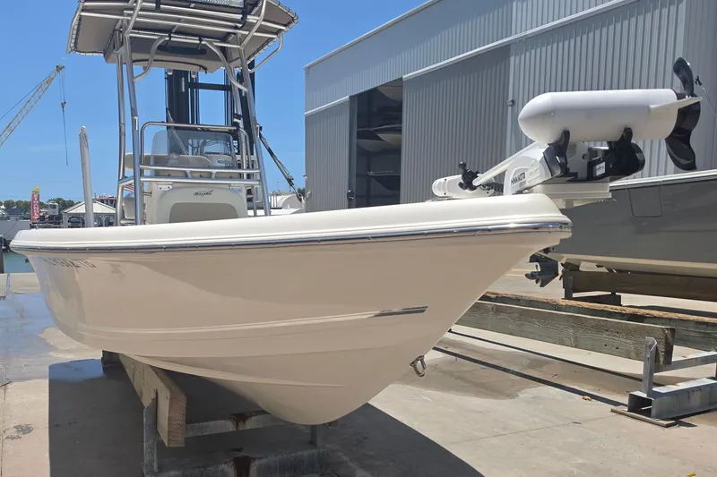 Slide: The Image of 2021 Bulls Bay 2200 boat on display at a marina dock. - 14